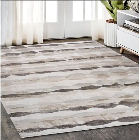 Beige and Brown Abstract Distressed Area Rug Photo 1