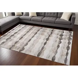 Photo of Beige and Brown Abstract Distressed Area Rug