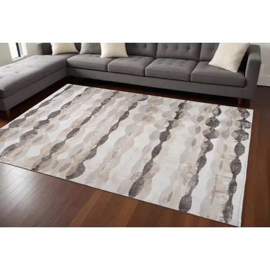 Beige and Brown Abstract Distressed Area Rug Photo 1