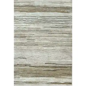 Photo of Beige and Brown Abstract Power Loom Distressed Area Rug