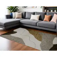 Photo of Beige and Brown Abstract Power Loom Distressed Area Rug