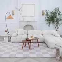 Photo of Beige and Brown Checkered Area Rug