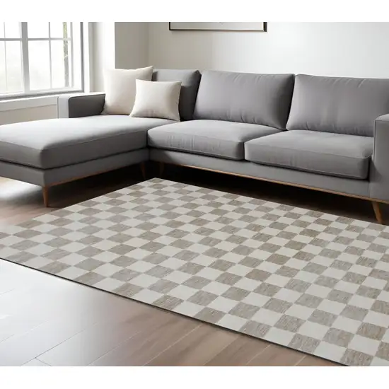 Beige and Brown Checkered Power Loom Area Rug Photo 1