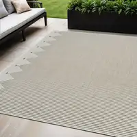 Photo of Beige and Brown Geometric Distressed Indoor Outdoor Area Rug