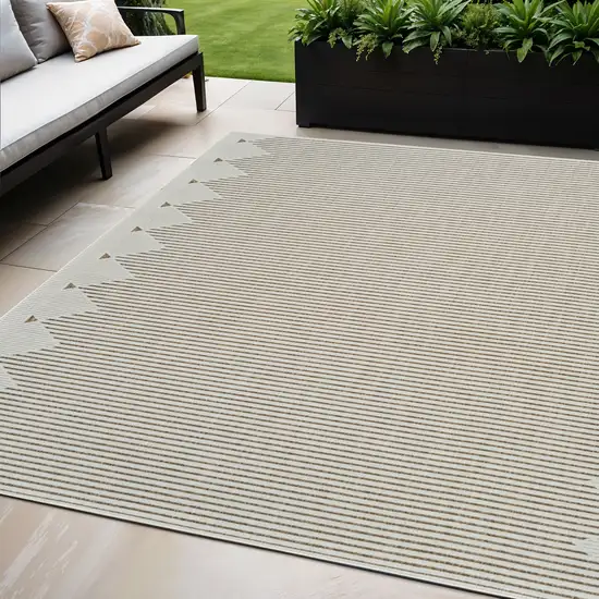 Beige and Brown Geometric Distressed Indoor Outdoor Area Rug Photo 1