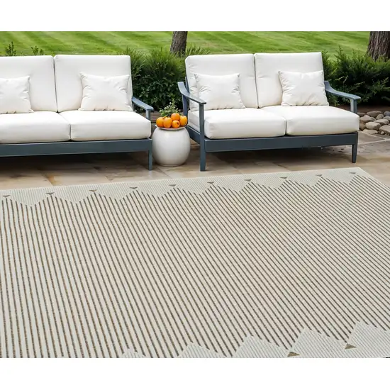 Beige and Brown Geometric Distressed Indoor Outdoor Area Rug Photo 1