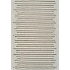 Photo of Beige and Brown Geometric Distressed Indoor Outdoor Area Rug