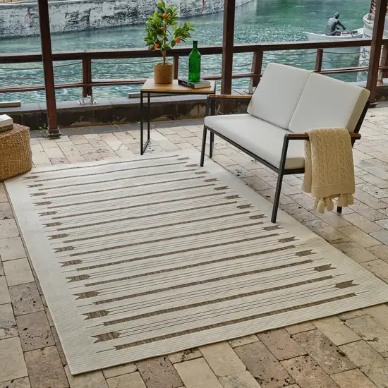 Beige and Brown Geometric Distressed Indoor Outdoor Area Rug Photo 9