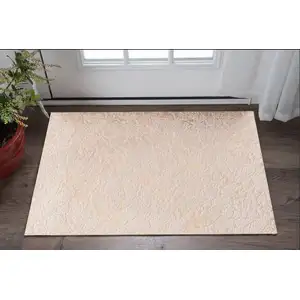 Photo of Beige and Gold Faux Fur Abstract Shag Non Skid Area Rug