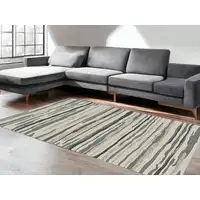 Photo of Beige and Gray Abstract Area Rug