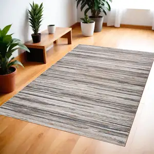 Photo of Beige and Gray Abstract Distressed Area Rug