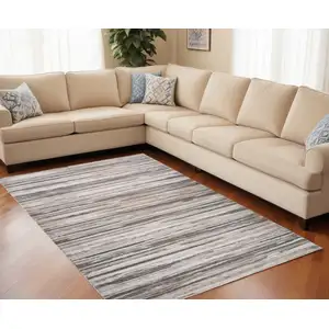 Photo of Beige and Gray Abstract Distressed Area Rug