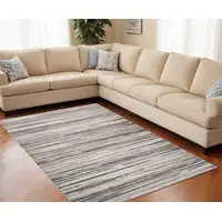 Photo of Beige and Gray Abstract Distressed Area Rug