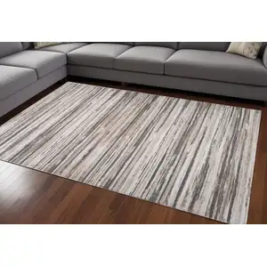 Photo of Beige and Gray Abstract Distressed Area Rug