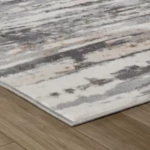 Photo of Beige and Gray Abstract Distressed Area Rug