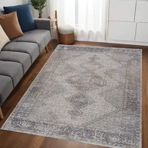 Photo of Beige and Gray Abstract Distressed Area Rug