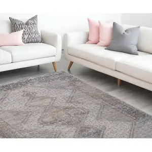 Photo of Beige and Gray Abstract Distressed Area Rug