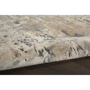 Photo of Beige and Gray Abstract Power Loom Area Rug