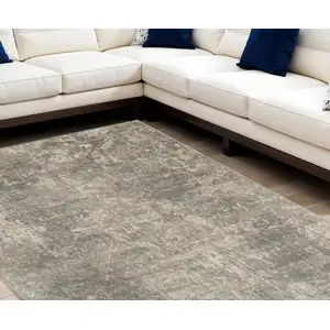 Photo of Beige and Gray Abstract Power Loom Area Rug