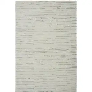 Photo of Beige and Gray Abstract Power Loom Distressed Area Rug