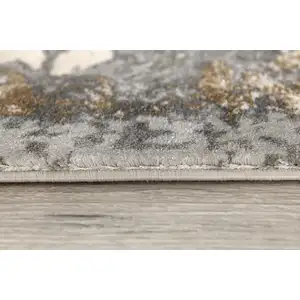 Photo of Beige and Gray Distressed Area Rug