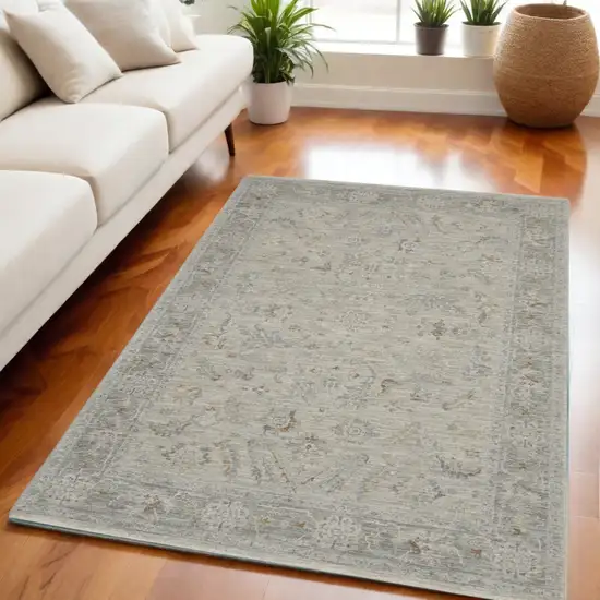 Beige and Gray Floral Power Loom Area Rug Photo 1