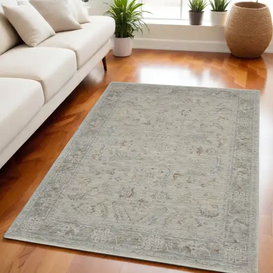 Beige and Gray Floral Power Loom Area Rug Photo 1