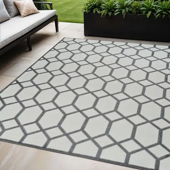 Beige and Gray Geometric Distressed Indoor Outdoor Area Rug Photo 1