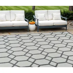 Photo of Beige and Gray Geometric Distressed Indoor Outdoor Area Rug