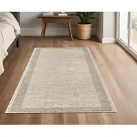 Photo of Beige and Gray Medallion Area Rug