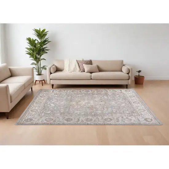 Beige and Gray Oriental Distressed Area Rug Photo 1