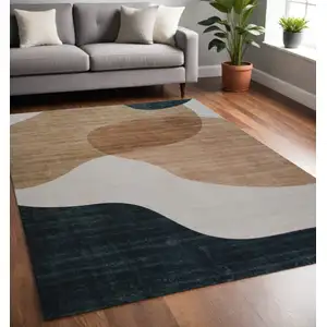 Photo of Beige and Green Abstract Distressed Area Rug