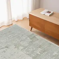 Photo of Beige and Green Abstract Distressed Area Rug