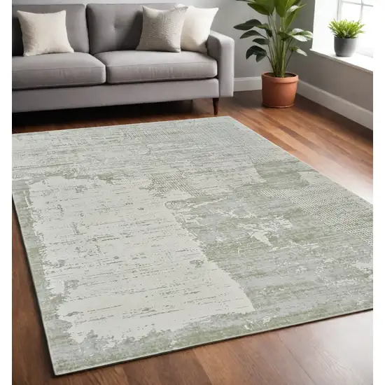 Beige and Green Abstract Distressed Area Rug Photo 1