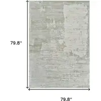 Photo of Beige and Green Abstract Distressed Area Rug