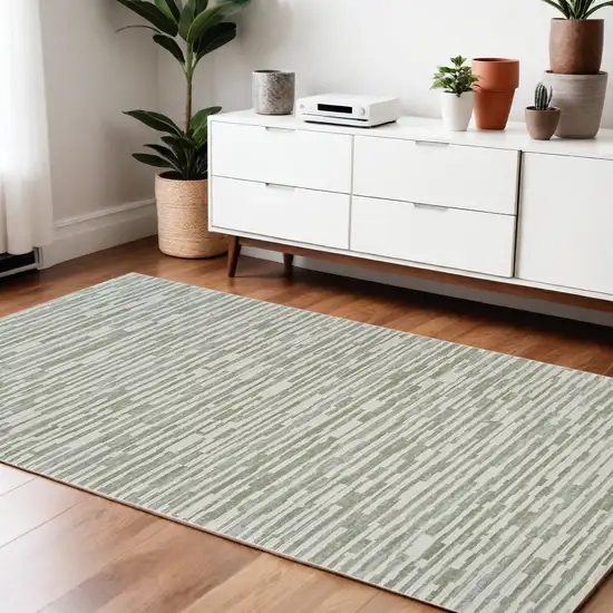 Beige and Green Abstract Distressed Area Rug Photo 1