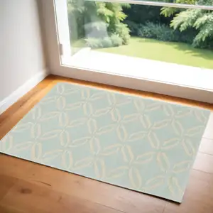 Photo of Beige and Green Trellis Area Rug