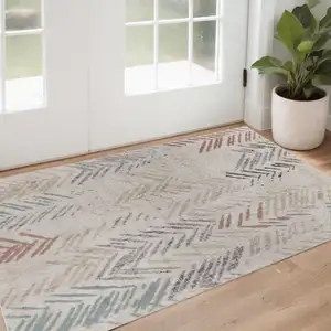 Photo of Beige and Ivory Abstract Area Rug