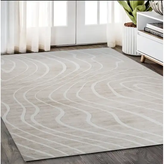 Beige and Ivory Abstract Distressed Area Rug Photo 1