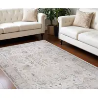 Photo of Beige and Ivory Abstract Distressed Area Rug