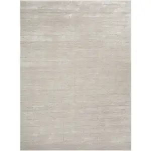 Photo of Beige and Ivory Abstract Power Loom Area Rug