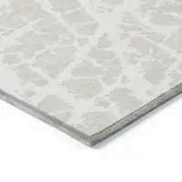 Photo of Beige and Ivory Abstract Washable Non Skid Indoor Outdoor Area Rug