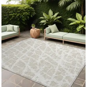 Photo of Beige and Ivory Abstract Washable Non Skid Indoor Outdoor Area Rug