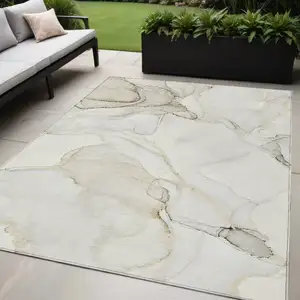 Photo of Beige and Ivory Abstract Washable Non Skid Indoor Outdoor Area Rug