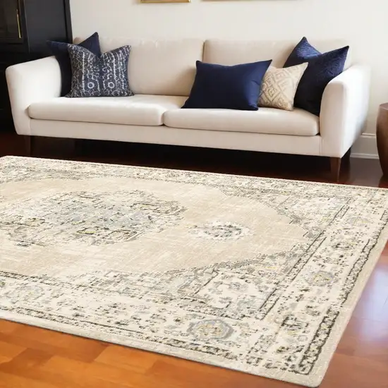 Beige And Ivory Center Jewel Area Rug Photo 1