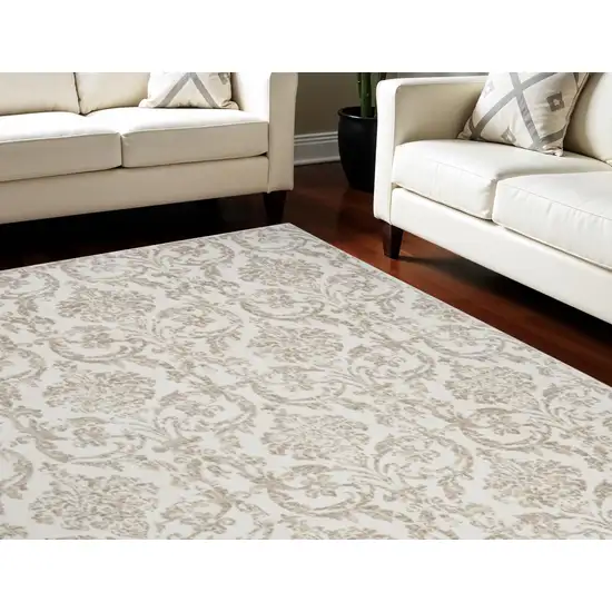 Beige and Ivory Damask Distressed Non Skid Area Rug Photo 1