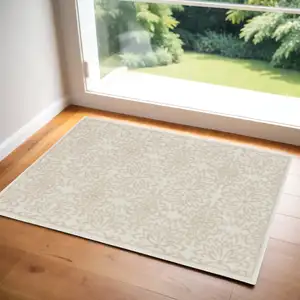 Photo of Beige and Ivory Floral Area Rug