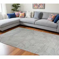 Photo of Beige and Ivory Floral Distressed Area Rug