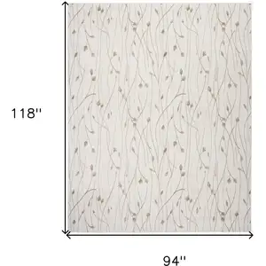 Photo of Beige and Ivory Floral Power Loom Area Rug