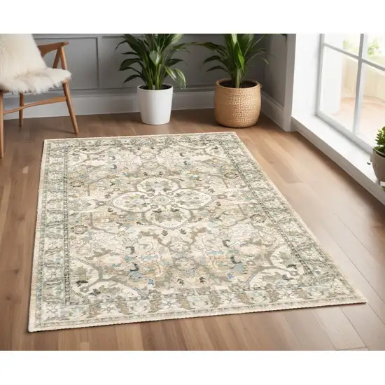 Beige And Ivory Medallion Area Rug Photo 1